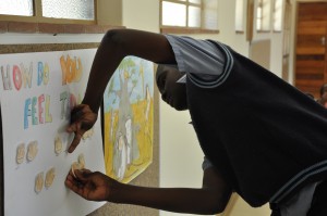 child using communication board